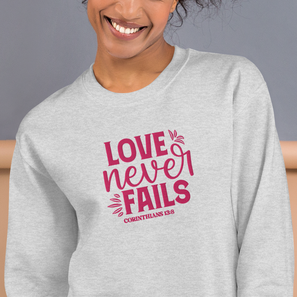 Love Never Fails Embroidered Women's Sweatshirt